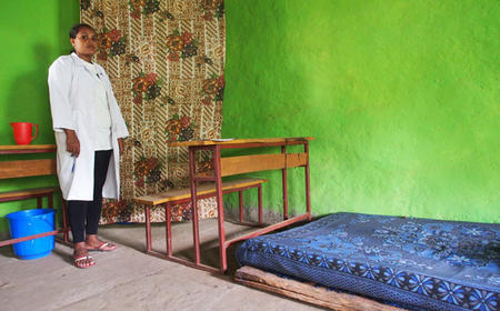 A lady in a specially made room for school girls during menstration