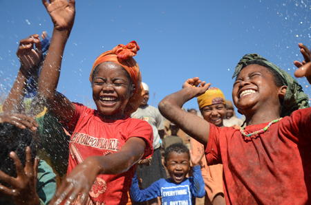 A moment of joy as water arrives in a village, Madagascar. 