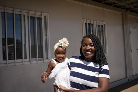 Valéria Estêvão with her baby Pierpina, at the Mecanhelas health centre. Niassa Province, Mozambique, Jul 28, 2022.