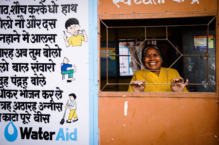 Chanda at her community's new toilet block in Delhi, India.