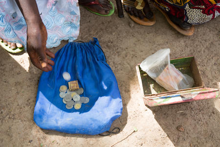 The women's group cashbox with some money, in the village of Samabogo, in the Circle of Bla, Region of Segou, Mali, May 2017