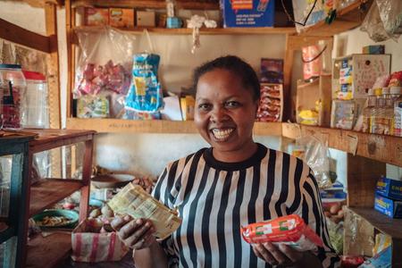Francoise Saholinirina, known as Madame Holy, in her shop which she has built up gradually over time, in the village of Ambatoantrano, Bongolava, Madagascar, September 2017.